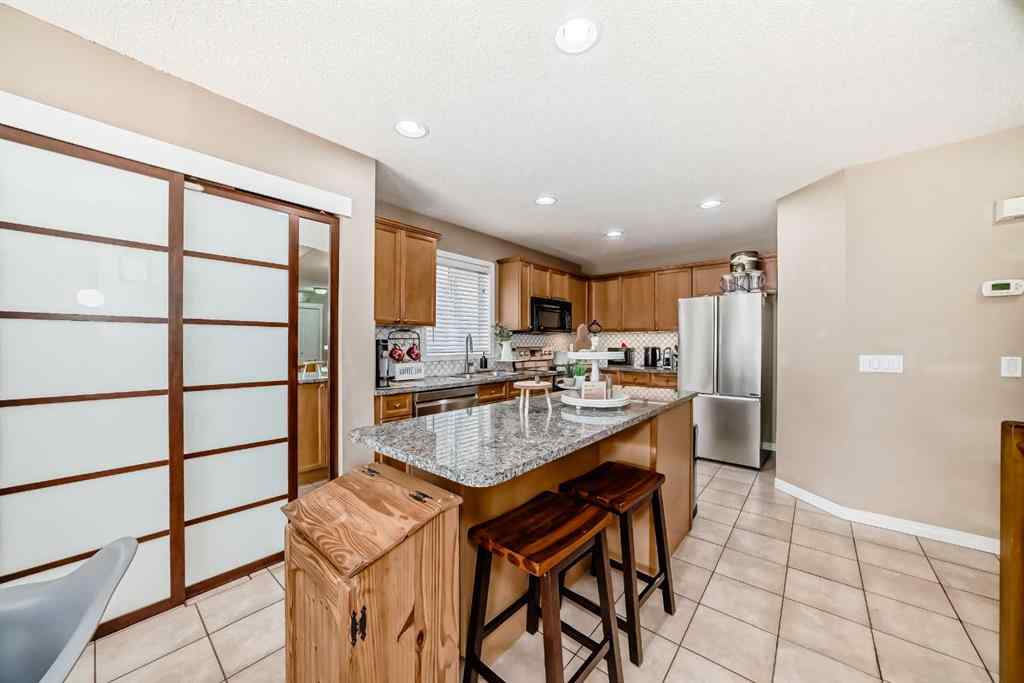 MLS® A2265399 - 423 Morningside Way SW in Morningside Airdrie, Residential