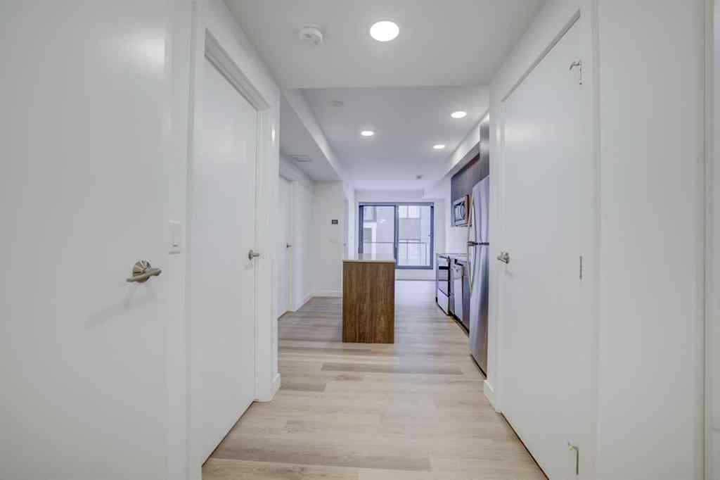 MLS® A2265402 - Unit #203 123 4 Street NE in Crescent Heights Calgary, Residential