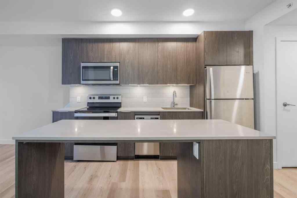 MLS® A2265402 - Unit #203 123 4 Street NE in Crescent Heights Calgary, Residential