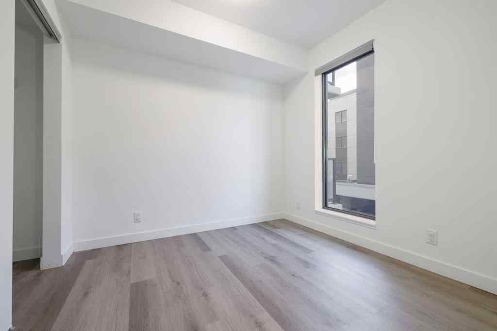 MLS® A2265402 - Unit #203 123 4 Street NE in Crescent Heights Calgary, Residential