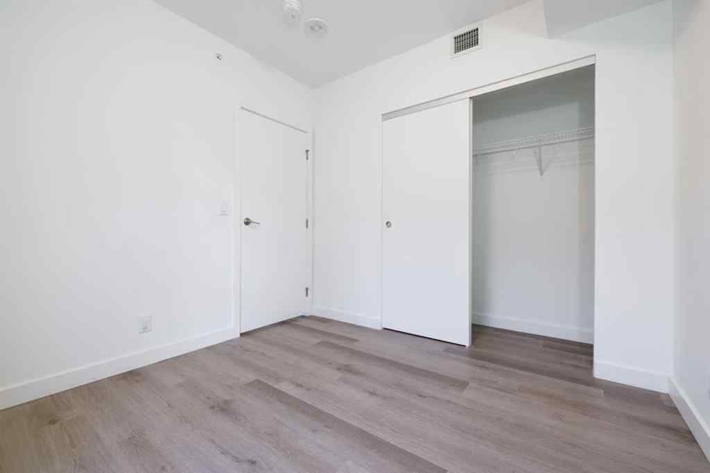 MLS® A2265402 - Unit #203 123 4 Street NE in Crescent Heights Calgary, Residential