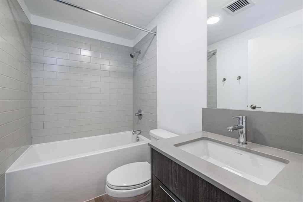 MLS® A2265402 - Unit #203 123 4 Street NE in Crescent Heights Calgary, Residential