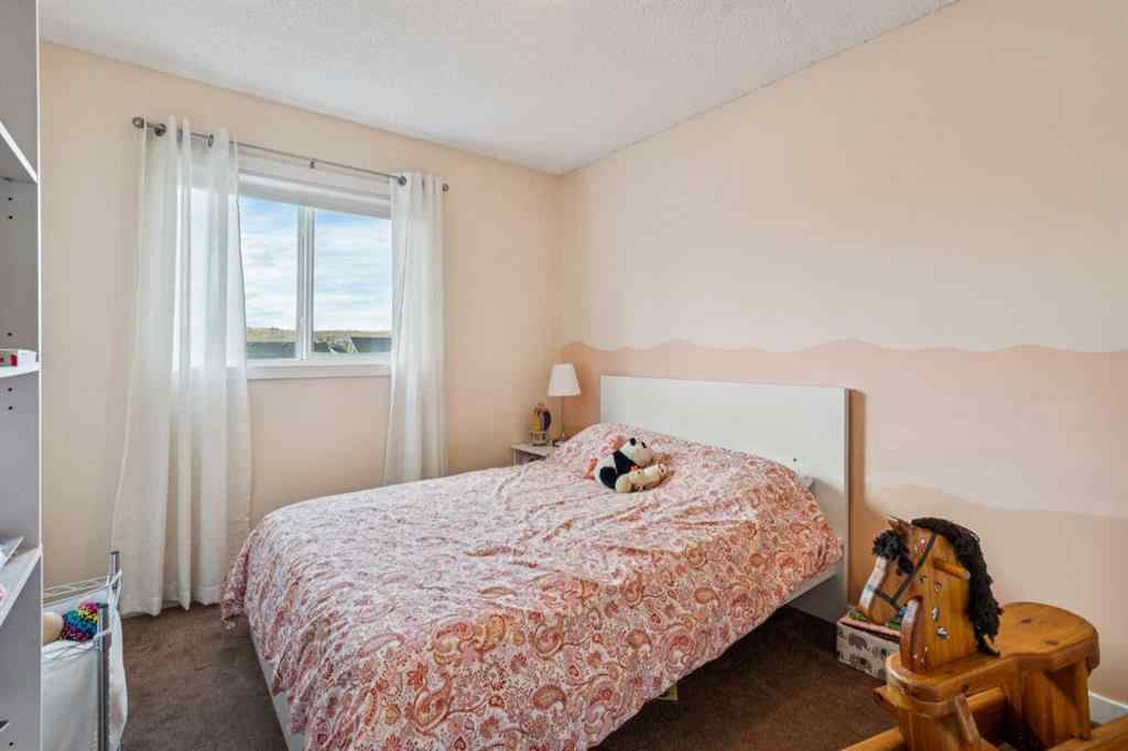 MLS® A2265408 - 480 River Heights Green  in River Heights Cochrane, Residential