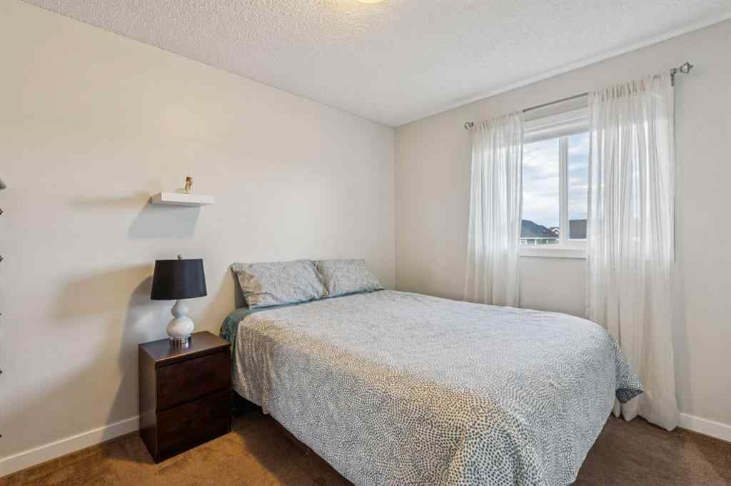 MLS® A2265408 - 480 River Heights Green  in River Heights Cochrane, Residential