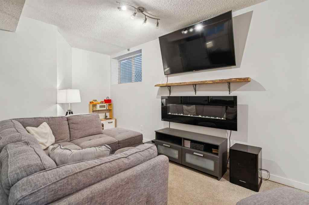 MLS® A2265408 - 480 River Heights Green  in River Heights Cochrane, Residential