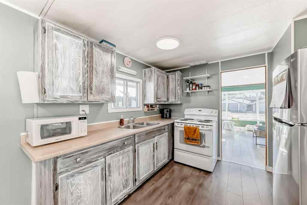 MLS® A2265414 - Unit #11 649 Main Street N in Sunridge Airdrie, Mobile