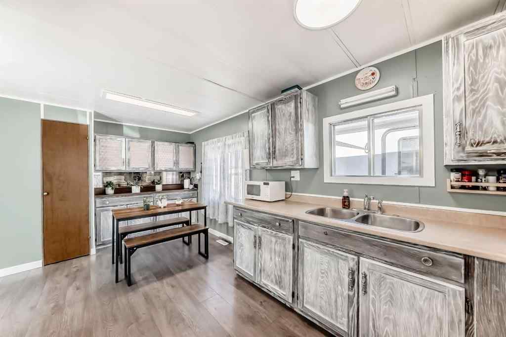 MLS® A2265414 - Unit #11 649 Main Street N in Sunridge Airdrie, Mobile