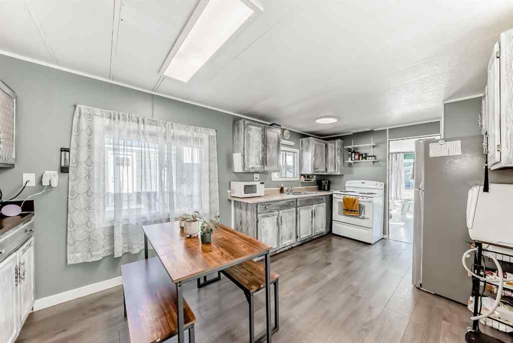 MLS® A2265414 - Unit #11 649 Main Street N in Sunridge Airdrie, Mobile