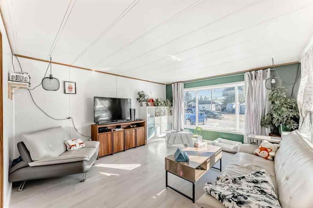 MLS® A2265414 - Unit #11 649 Main Street N in Sunridge Airdrie, Mobile