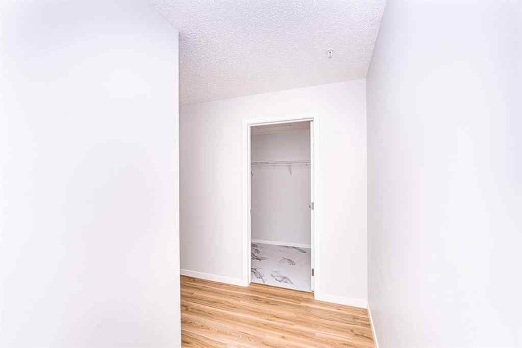 MLS® A2265415 - Unit #215 40 Carrington Plaza NW in Carrington Calgary, Residential