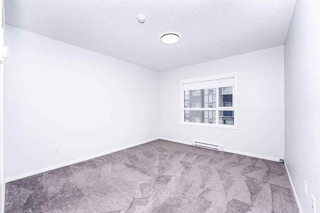 MLS® A2265415 - Unit #215 40 Carrington Plaza NW in Carrington Calgary, Residential