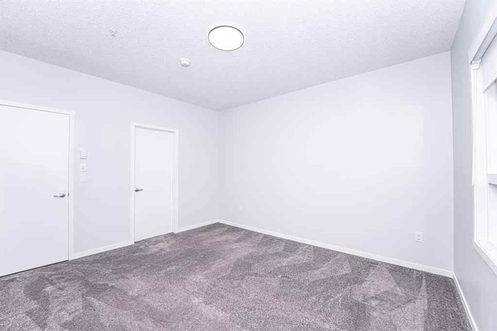 MLS® A2265415 - Unit #215 40 Carrington Plaza NW in Carrington Calgary, Residential