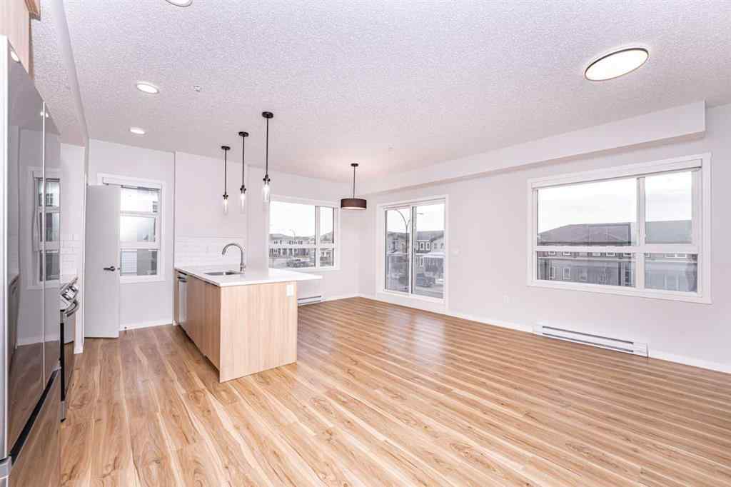 MLS® A2265415 - Unit #215 40 Carrington Plaza NW in Carrington Calgary, Residential