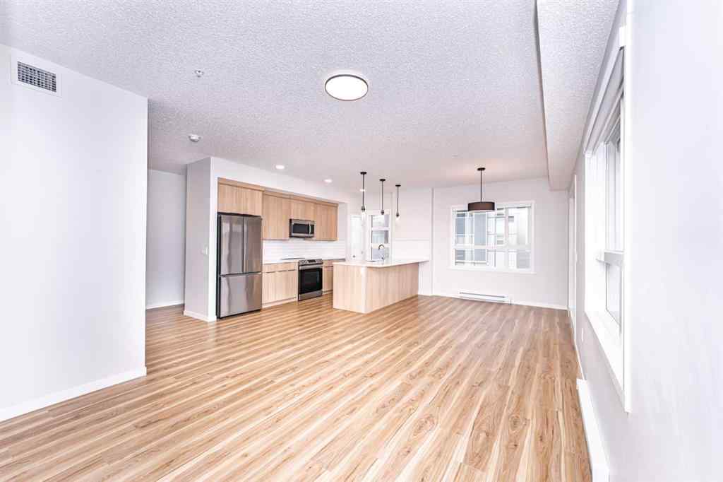 MLS® A2265415 - Unit #215 40 Carrington Plaza NW in Carrington Calgary, Residential
