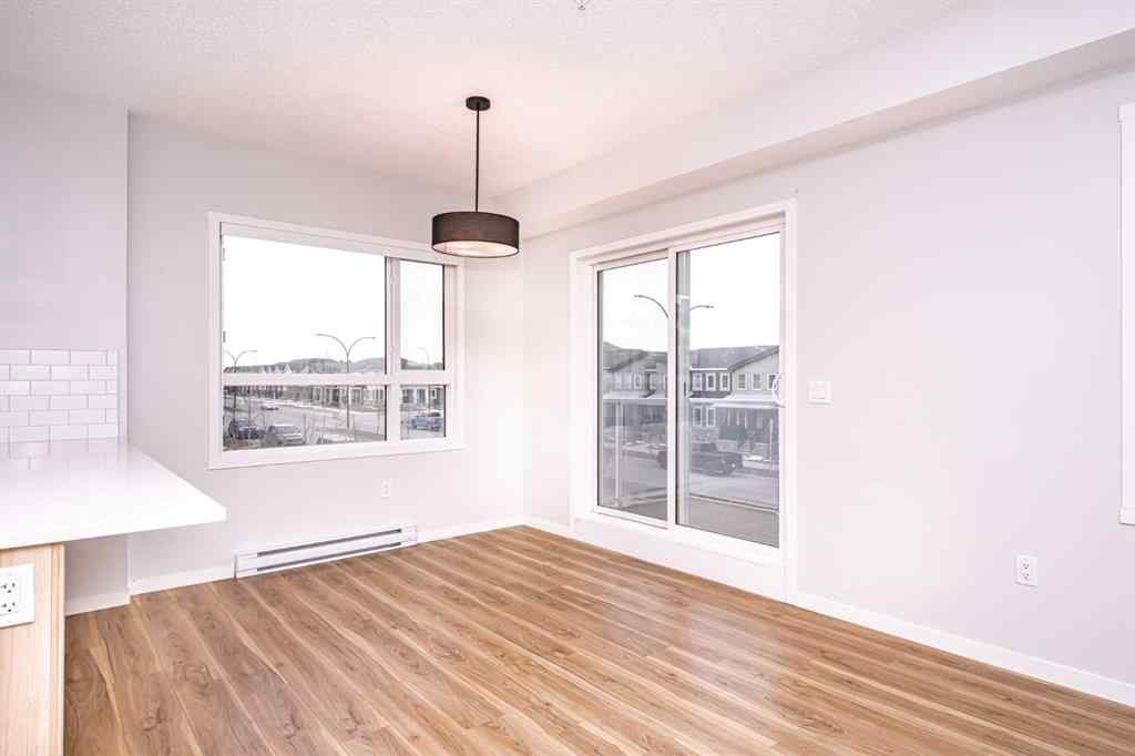 MLS® A2265415 - Unit #215 40 Carrington Plaza NW in Carrington Calgary, Residential