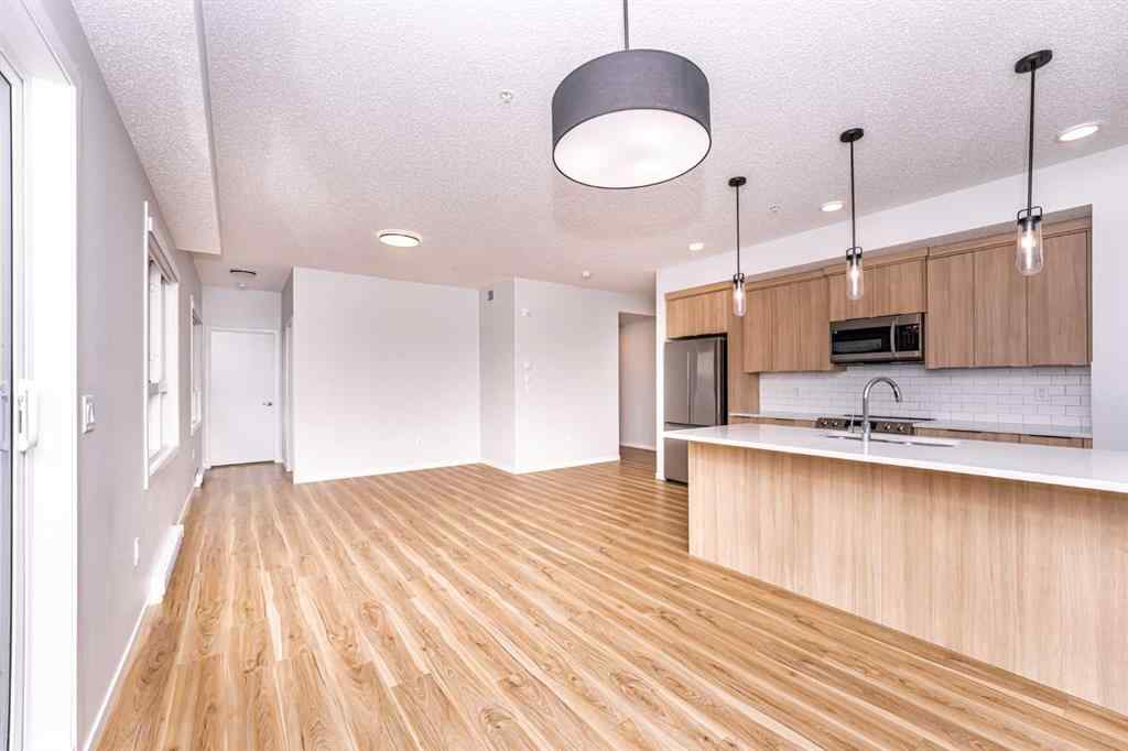 MLS® A2265415 - Unit #215 40 Carrington Plaza NW in Carrington Calgary, Residential