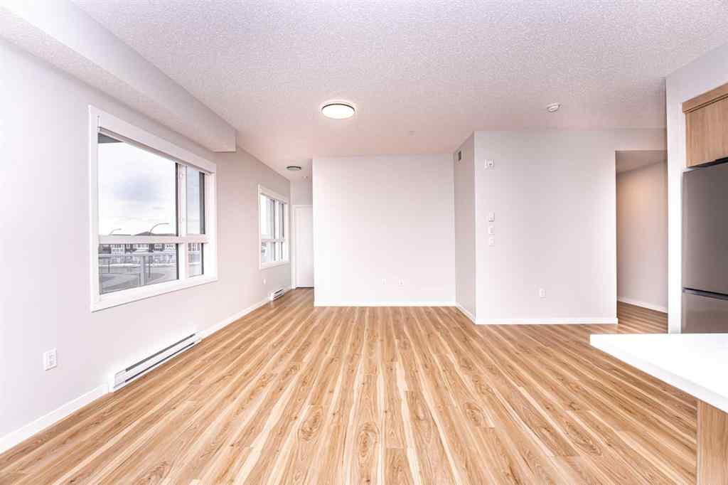 MLS® A2265415 - Unit #215 40 Carrington Plaza NW in Carrington Calgary, Residential