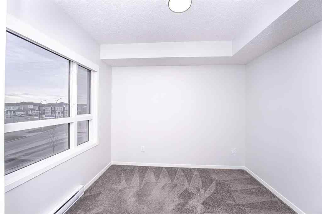 MLS® A2265415 - Unit #215 40 Carrington Plaza NW in Carrington Calgary, Residential