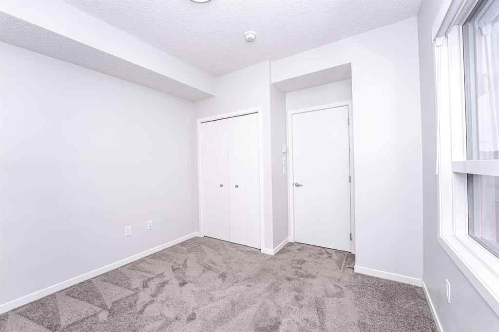 MLS® A2265415 - Unit #215 40 Carrington Plaza NW in Carrington Calgary, Residential