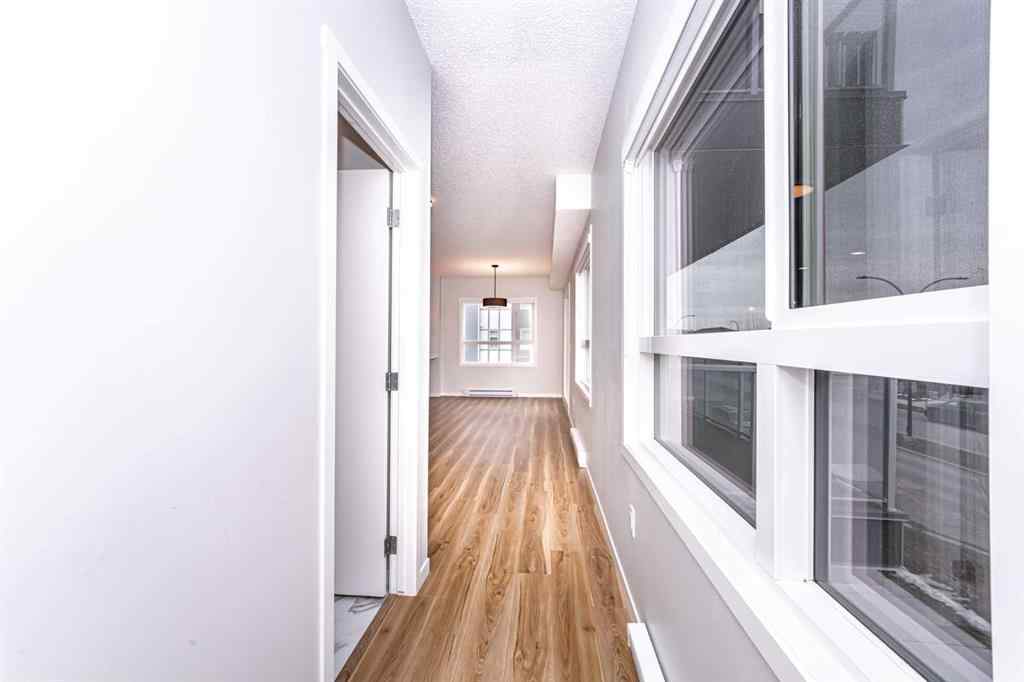 MLS® A2265415 - Unit #215 40 Carrington Plaza NW in Carrington Calgary, Residential