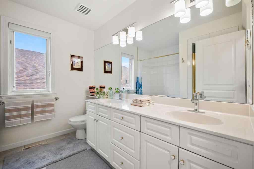 MLS® A2265421 - 136 Patrick View SW in Patterson Calgary, Residential