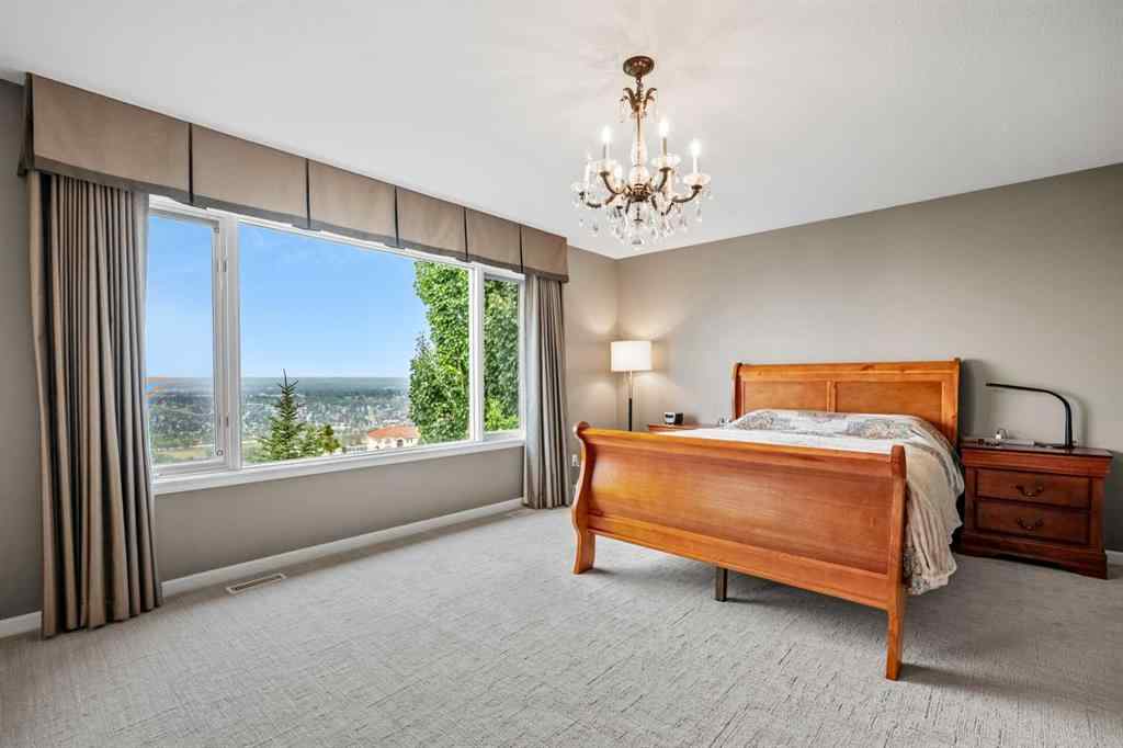 MLS® A2265421 - 136 Patrick View SW in Patterson Calgary, Residential