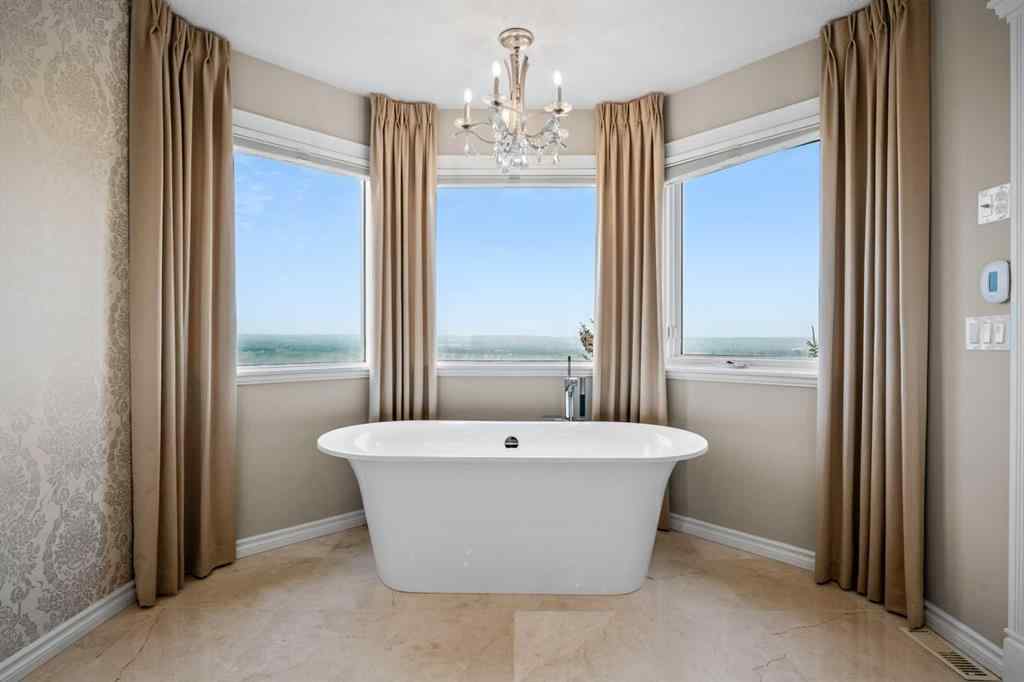 MLS® A2265421 - 136 Patrick View SW in Patterson Calgary, Residential