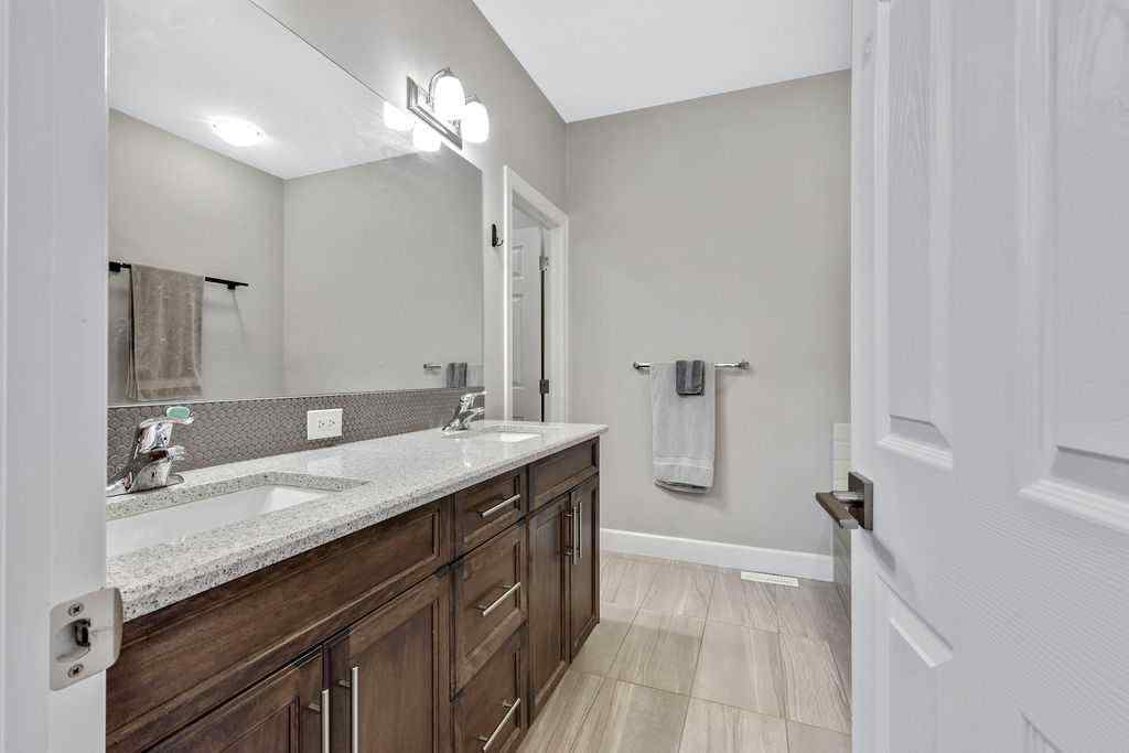 MLS® A2265425 - 165 Carrington Close NW in Carrington Calgary, Residential