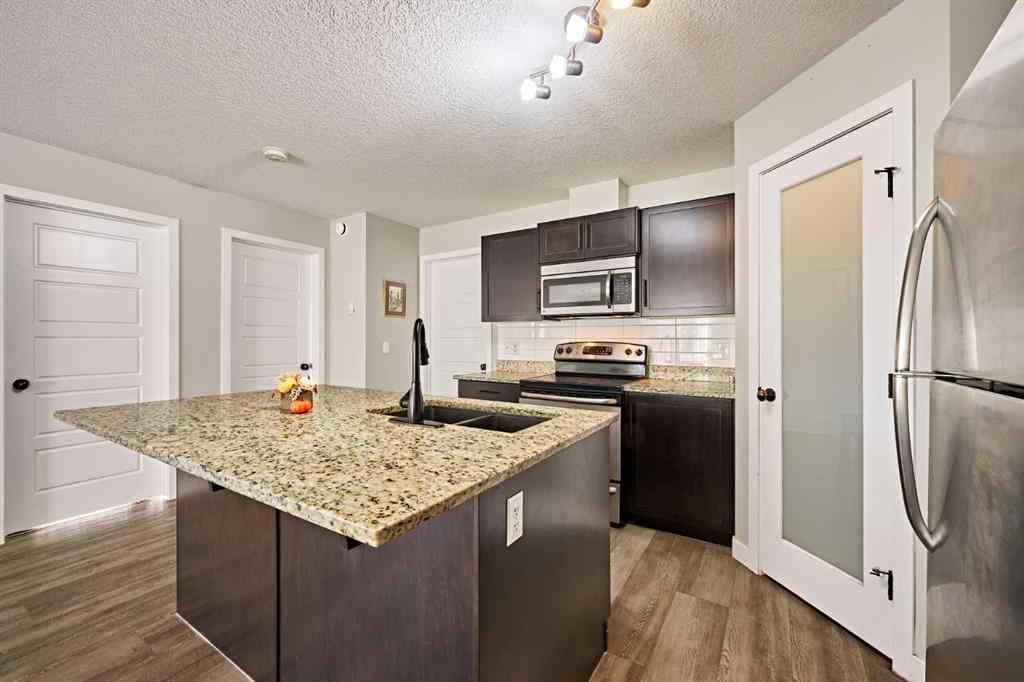 MLS® A2265437 - Unit #7101 2781 Chinook Winds Drive SW in Prairie Springs Airdrie, Residential
