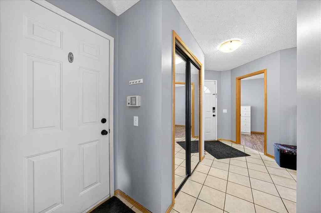 MLS&reg; # A2265441 - 64 Macewan Park Rise NW in MacEwan Glen Calgary, Residential Open Houses