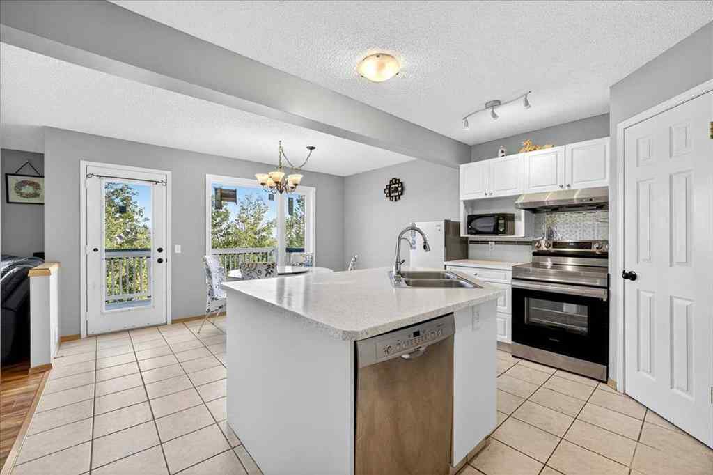 MLS&reg; # A2265441 - 64 Macewan Park Rise NW in MacEwan Glen Calgary, Residential Open Houses