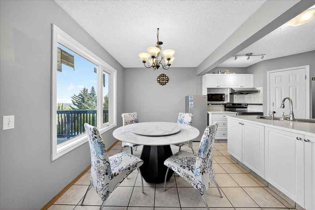 MLS&reg; # A2265441 - 64 Macewan Park Rise NW in MacEwan Glen Calgary, Residential Open Houses
