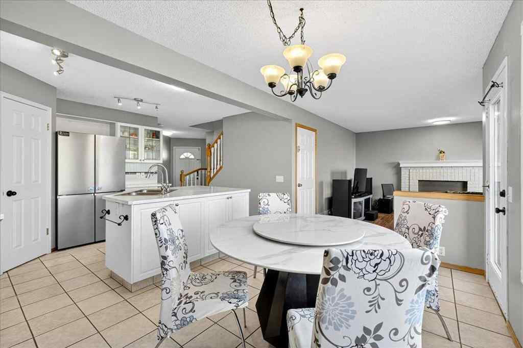MLS&reg; # A2265441 - 64 Macewan Park Rise NW in MacEwan Glen Calgary, Residential Open Houses