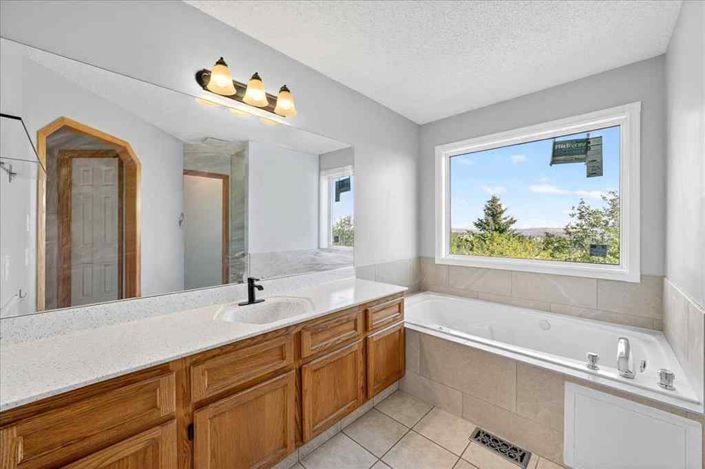 MLS&reg; # A2265441 - 64 Macewan Park Rise NW in MacEwan Glen Calgary, Residential Open Houses