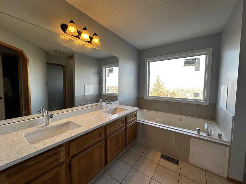MLS&reg; # A2265441 - 64 Macewan Park Rise NW in MacEwan Glen Calgary, Residential Open Houses