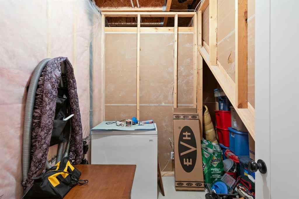 MLS® A2265442 - 219 River Heights Green  in River Song Cochrane, Residential