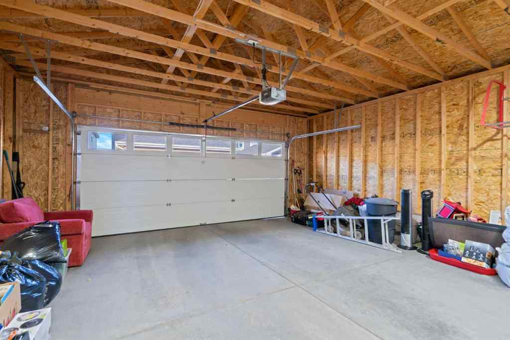 MLS® A2265442 - 219 River Heights Green  in River Song Cochrane, Residential