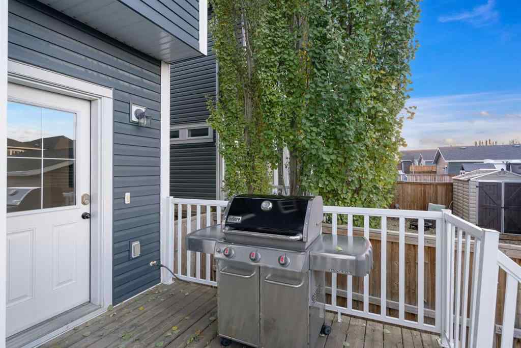 MLS® A2265442 - 219 River Heights Green  in River Song Cochrane, Residential