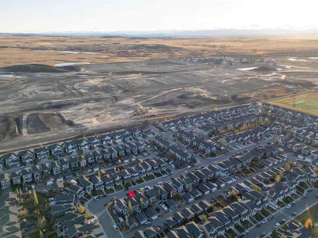 MLS® A2265442 - 219 River Heights Green  in River Song Cochrane, Residential