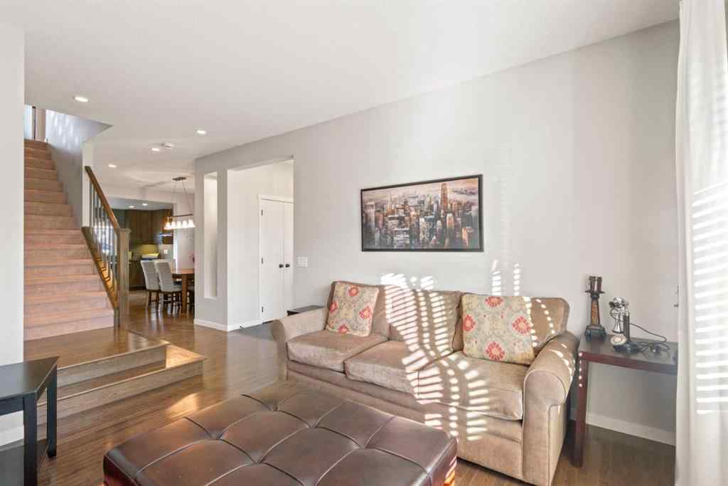 MLS® A2265442 - 219 River Heights Green  in River Song Cochrane, Residential