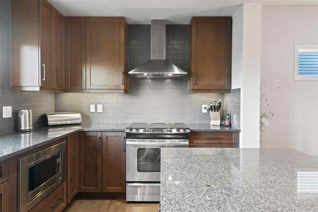 MLS® A2265442 - 219 River Heights Green  in River Song Cochrane, Residential