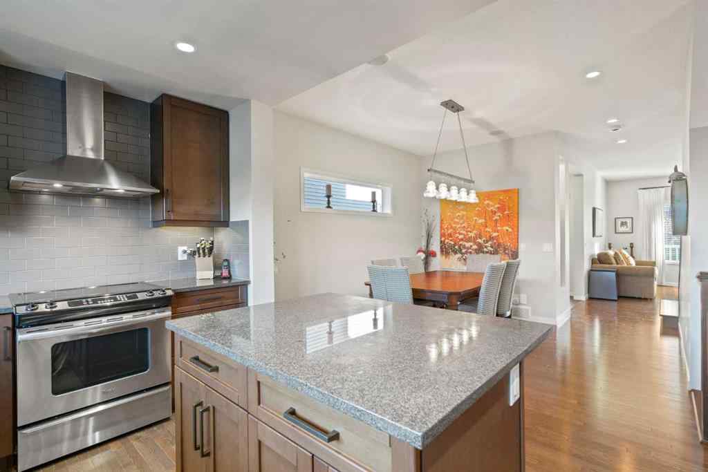 MLS® A2265442 - 219 River Heights Green  in River Song Cochrane, Residential