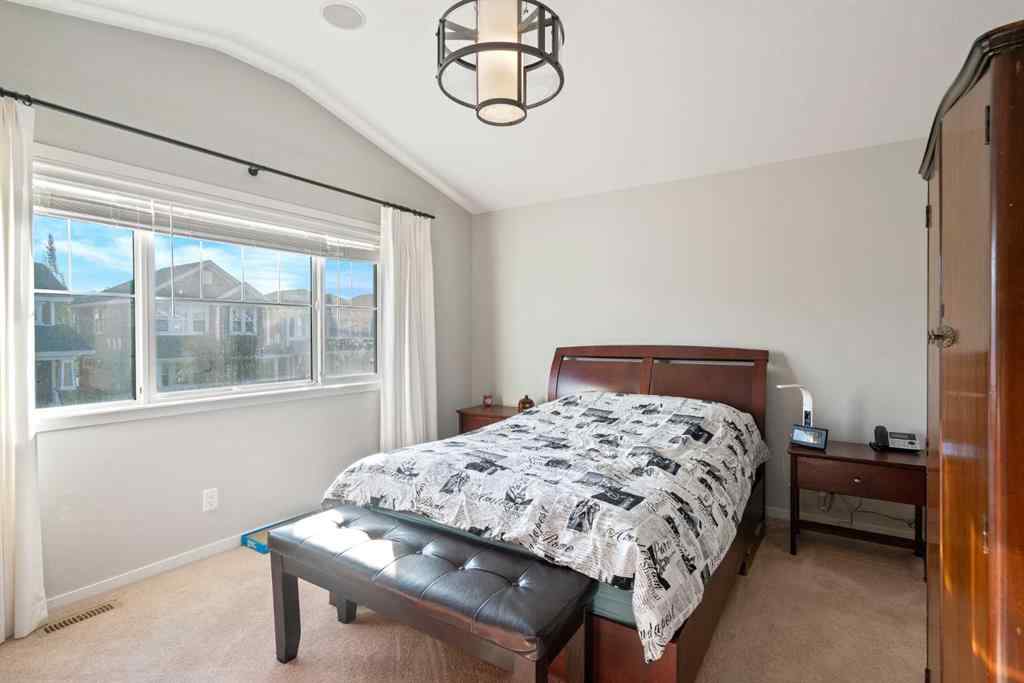 MLS® A2265442 - 219 River Heights Green  in River Song Cochrane, Residential