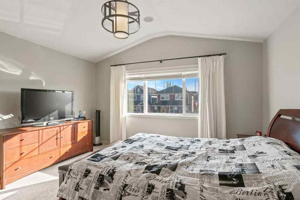 MLS® A2265442 - 219 River Heights Green  in River Song Cochrane, Residential