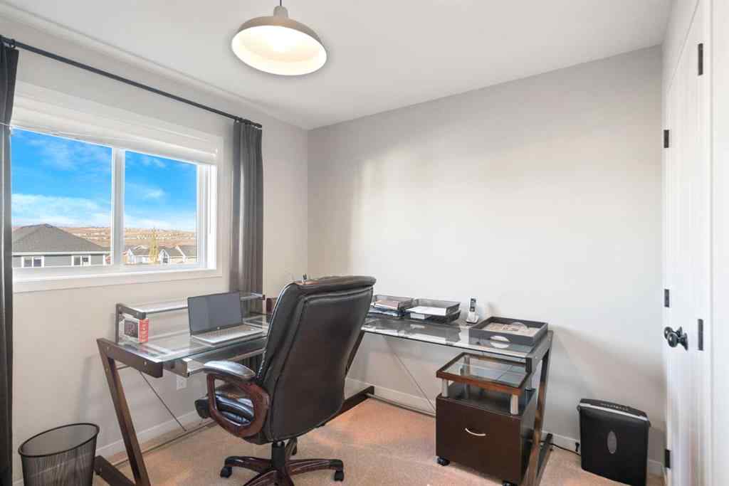 MLS® A2265442 - 219 River Heights Green  in River Song Cochrane, Residential