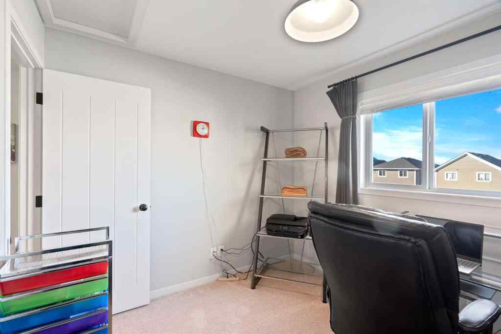 MLS® A2265442 - 219 River Heights Green  in River Song Cochrane, Residential