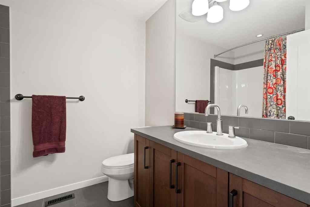 MLS® A2265442 - 219 River Heights Green  in River Song Cochrane, Residential