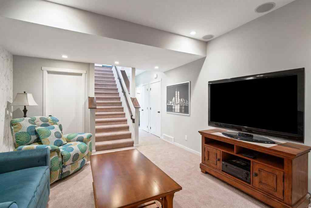 MLS® A2265442 - 219 River Heights Green  in River Song Cochrane, Residential