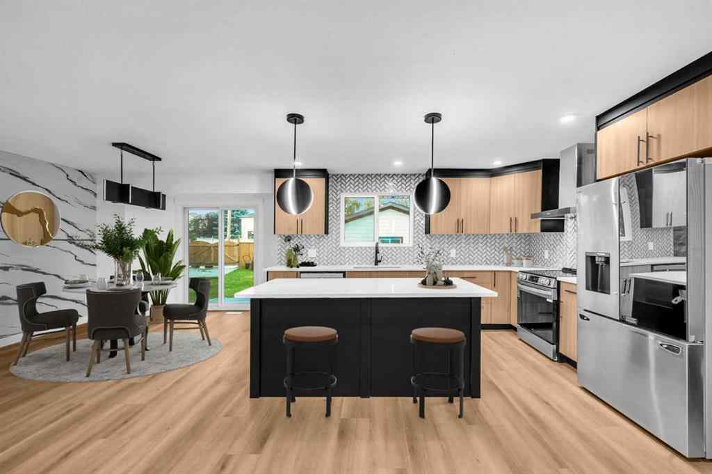 MLS® A2265453 - 423 Queensland Circle SE in Queensland Calgary, Residential