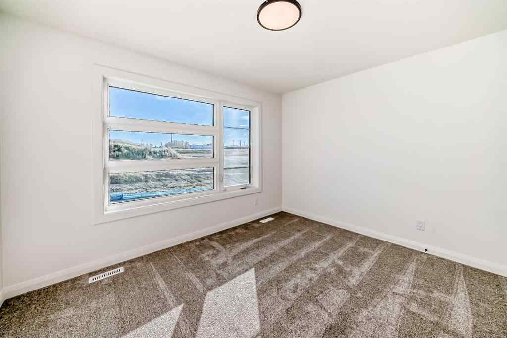 MLS® A2265454 - 271 Rivercrest Boulevard  in Rivercrest Cochrane, Residential